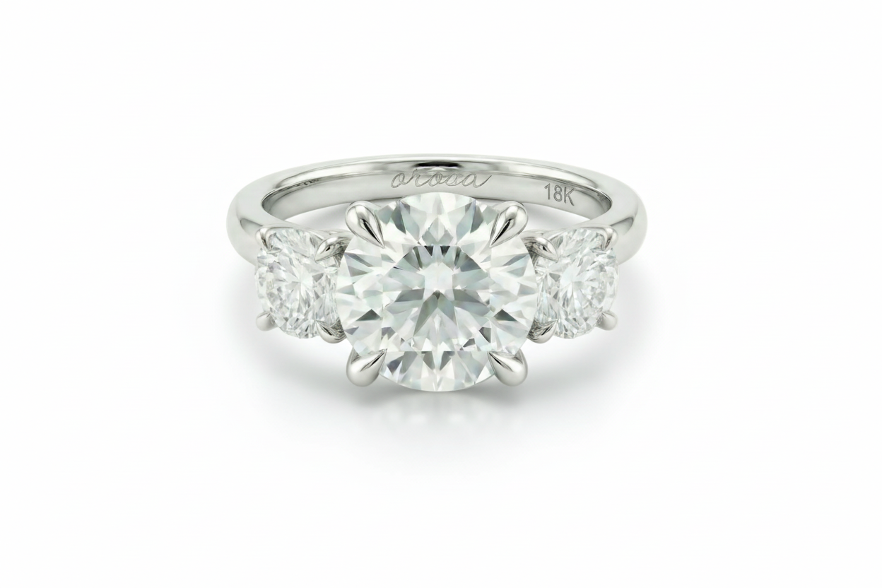 Diamond ring with '18K' marking on a white background