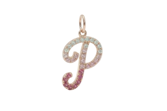 Gold letter 'P' pendant with gemstones on a white background
