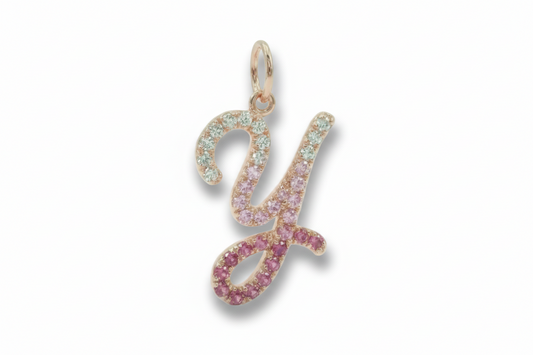 Letter 'Y' pendant with gemstones on a white background