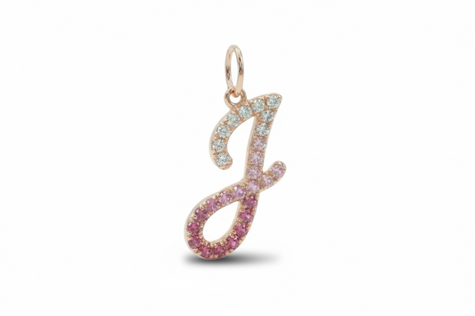 Pendant with letter 'J' design on a white background