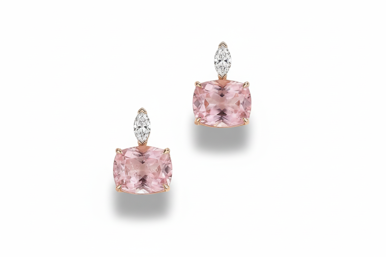 Pair of pink morganite earrings with rose gold setting on a white background